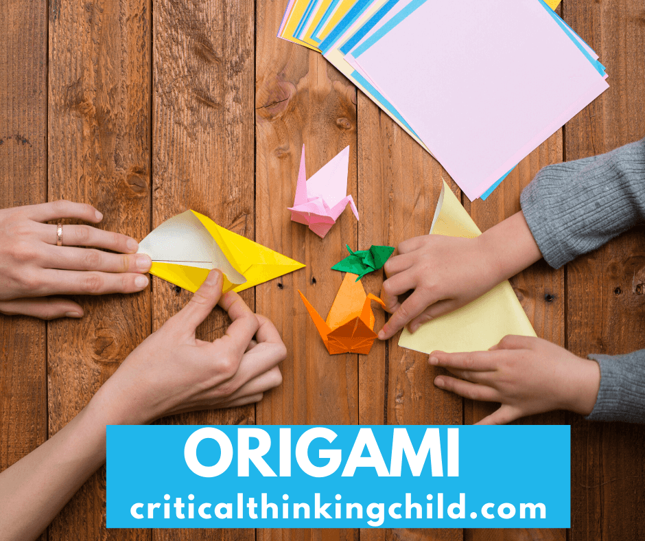 hands doing paper folding and origami